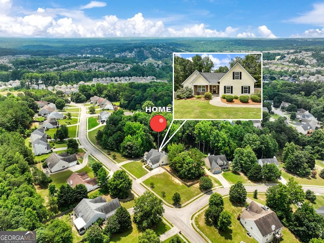 6439 Mossy Boulder Dr, Flowery Branch, GA 30542 - aerial perspective of suburban area featuring property boundaries highlighted