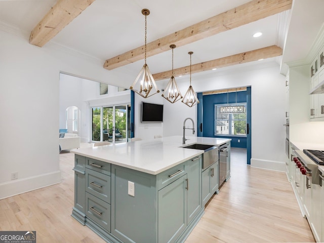 5832 Lula Bridge Ln, Braselton, GA 30517 - kitchen featuring a chandelier, light wood-type flooring, appliances with stainless steel finishes, beam ceiling, and light countertops