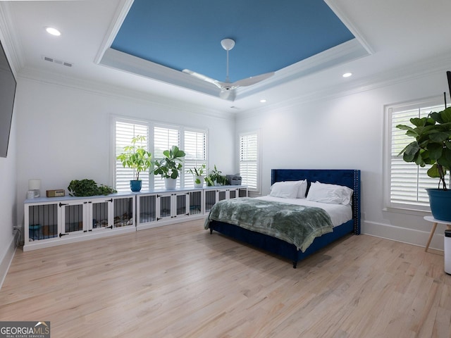 5832 Lula Bridge Ln, Braselton, GA 30517 - bedroom featuring a raised ceiling, wood finished floors, ornamental molding, and recessed lighting