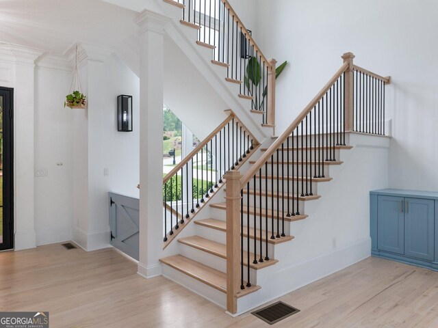 5832 Lula Bridge Ln, Braselton, GA 30517 - stairs featuring wood finished floors and baseboards
