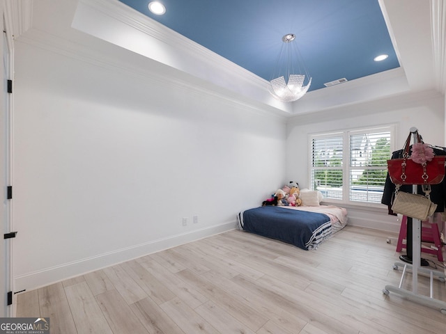 5832 Lula Bridge Ln, Braselton, GA 30517 - bedroom with a raised ceiling, wood finished floors, a chandelier, crown molding, and recessed lighting
