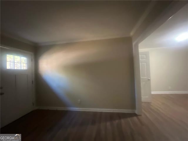 2785 Battle Forrest, Decatur, GA 30034 - unfurnished room featuring dark wood-style flooring, baseboards, and ornamental molding
