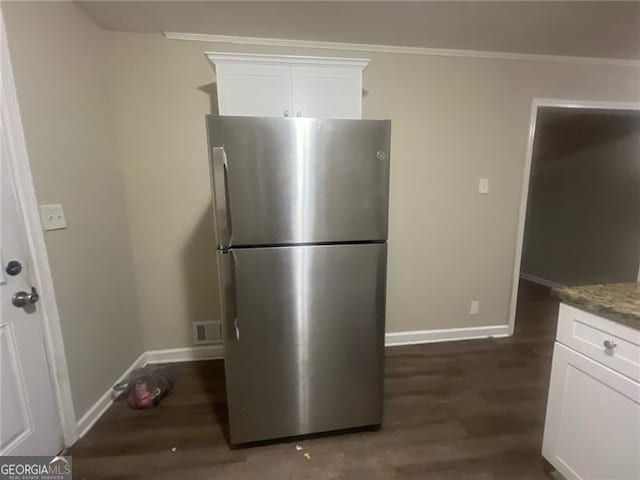 2785 Battle Forrest, Decatur, GA 30034 - kitchen featuring freestanding refrigerator, baseboards, white cabinets, crown molding, and dark wood-style floors