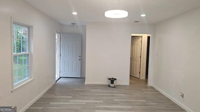 3685 Rice Mill Rd, Macon, GA 31206 - spare room featuring light wood-type flooring, baseboards, and recessed lighting
