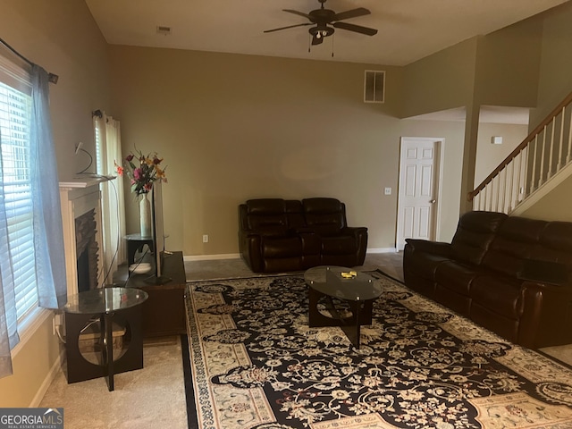 5327 Yoshino Ter, Powder Springs, GA 30127 - living room featuring a ceiling fan, plenty of natural light, carpet, and stairs