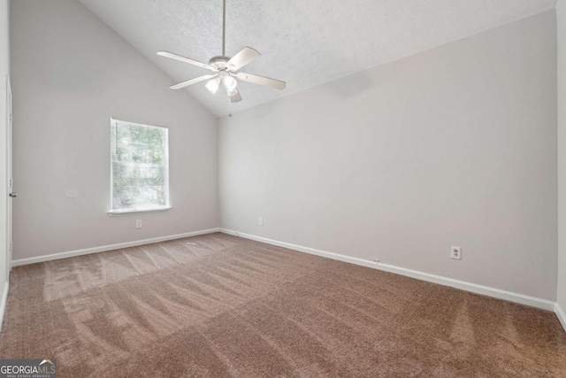4448 Janice Dr, Snellville, GA 30039 - carpeted spare room with a ceiling fan, a textured ceiling, baseboards, and lofted ceiling