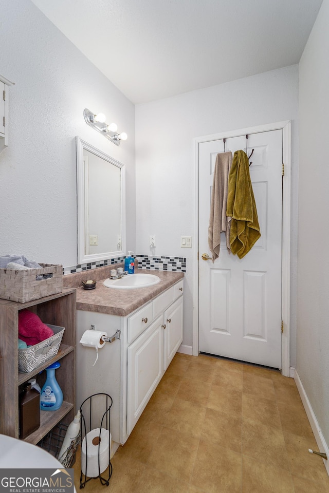 6162 Ayrin Brooke Ln, Blackshear, GA 31516 - bathroom with vanity and baseboards