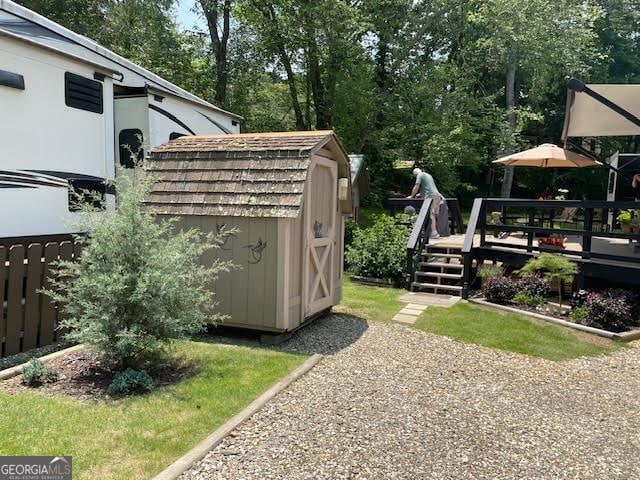326 Choestoe Valley Cir Unit L 37, Blairsville, GA 30512 - view of yard featuring a deck and view of wooded area