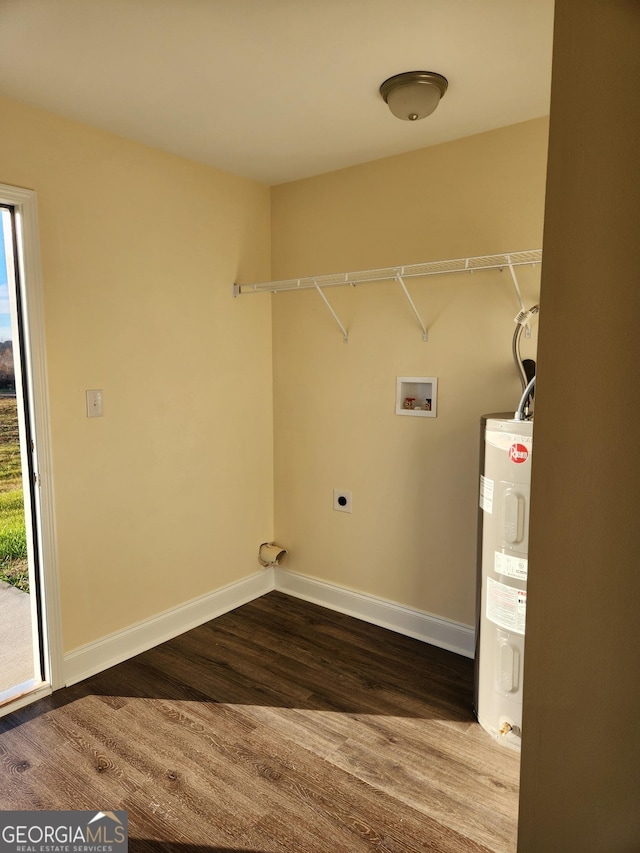 116 Ronald Pride Blvd, Fort Valley, GA 31030 - washroom featuring electric water heater, electric dryer hookup, wood finished floors, and hookup for a washing machine