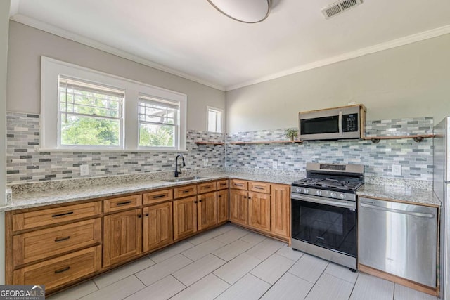 975 Dill Ave SW, Atlanta, GA 30310 - kitchen featuring appliances with stainless steel finishes, open shelves, tasteful backsplash, and crown molding
