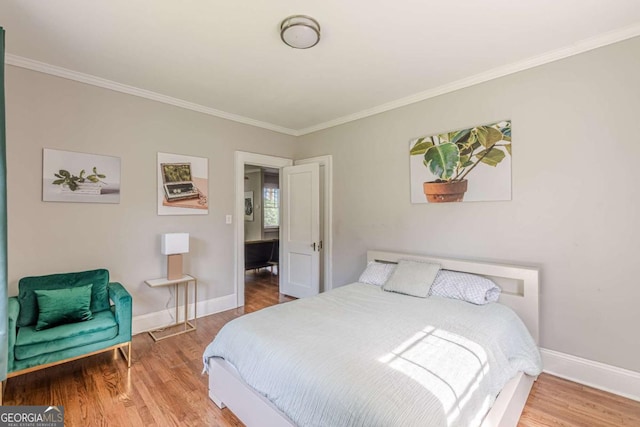 975 Dill Ave SW, Atlanta, GA 30310 - bedroom with ornamental molding and wood finished floors