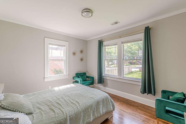 975 Dill Ave SW, Atlanta, GA 30310 - bedroom featuring ornamental molding and wood finished floors