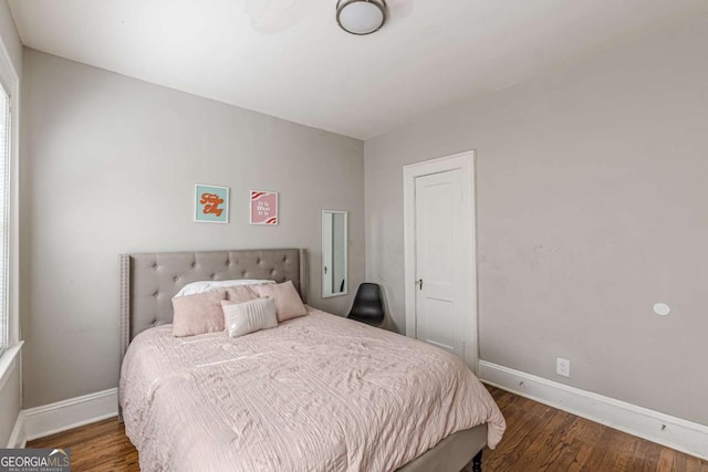 975 Dill Ave SW, Atlanta, GA 30310 - bedroom featuring baseboards and wood finished floors
