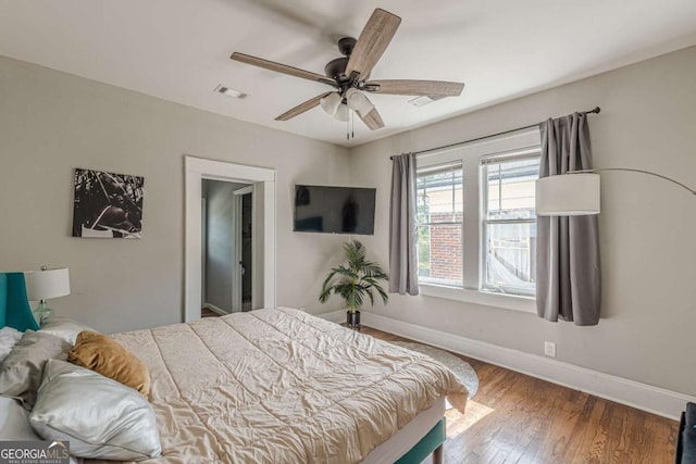 975 Dill Ave SW, Atlanta, GA 30310 - bedroom featuring wood finished floors and ceiling fan