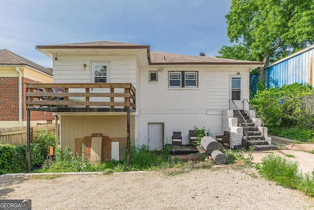 975 Dill Ave SW, Atlanta, GA 30310 - back of property with stairway and a wooden deck