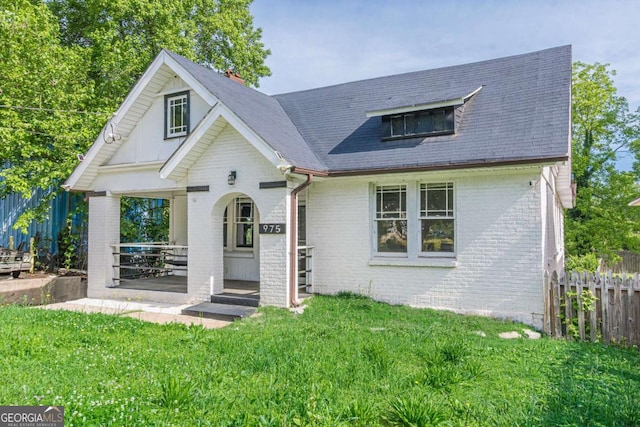 975 Dill Ave SW, Atlanta, GA 30310 - view of front of house with brick siding and roof with shingles