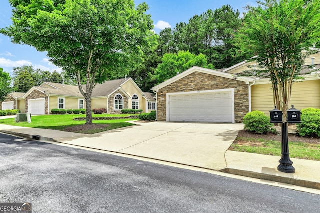 140 Rehobeth Way, Fayetteville, GA 30214 - ranch-style house with stone siding, driveway, a garage, and a front yard