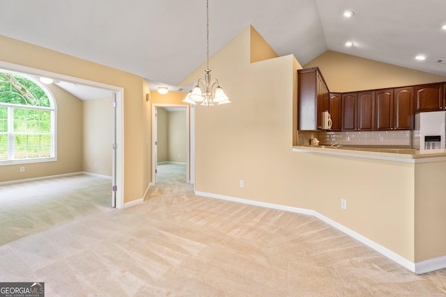 140 Rehobeth Way, Fayetteville, GA 30214 - kitchen with fridge with ice dispenser, lofted ceiling, a chandelier, light colored carpet, and recessed lighting