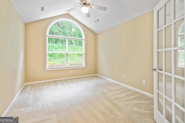 140 Rehobeth Way, Fayetteville, GA 30214 - unfurnished room with vaulted ceiling, healthy amount of natural light, and carpet flooring