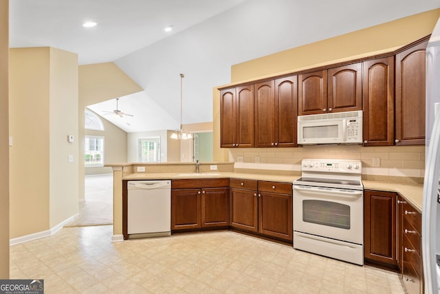 140 Rehobeth Way, Fayetteville, GA 30214 - kitchen featuring white appliances, a peninsula, light countertops, a ceiling fan, and lofted ceiling