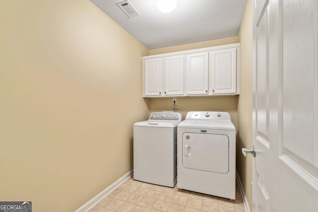 140 Rehobeth Way, Fayetteville, GA 30214 - laundry room with washer and dryer and cabinet space