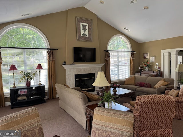 140 Rehobeth Way, Fayetteville, GA 30214 - carpeted living area with lofted ceiling and a tiled fireplace