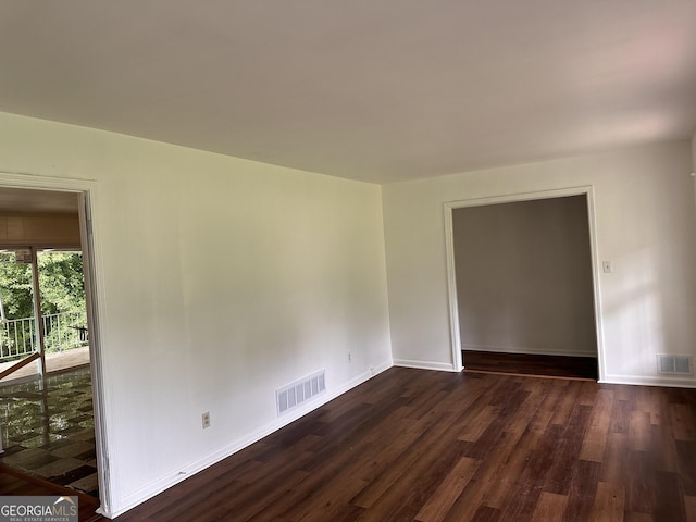 2969 Favor Rd SW, Marietta, GA 30060 - spare room featuring dark wood-style floors and baseboards