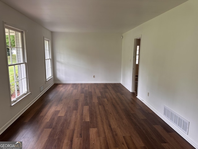 2969 Favor Rd SW, Marietta, GA 30060 - spare room with plenty of natural light, dark wood finished floors, and baseboards