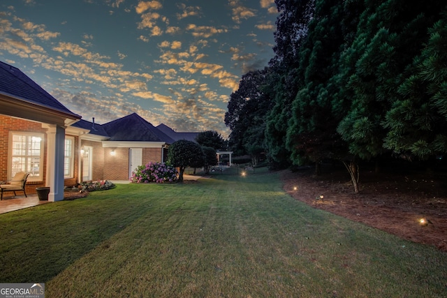 3468 Aberrone Pl, Buford, GA 30519 - view of grassy yard with a patio