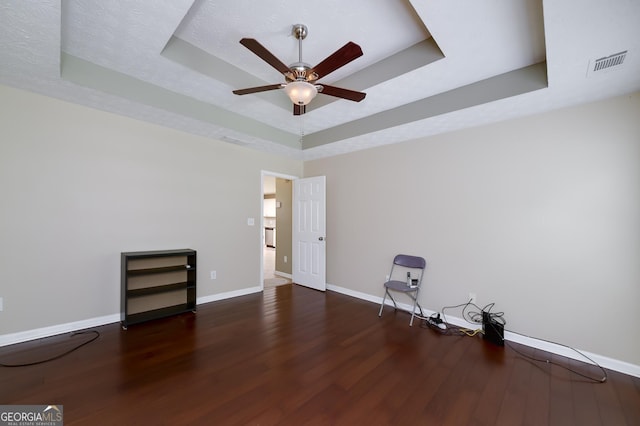 35 Deep Springs Way, Covington, GA 30016 - spare room with a raised ceiling, ceiling fan, wood finished floors, and baseboards