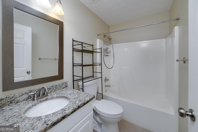 35 Deep Springs Way, Covington, GA 30016 - full bath with vanity, bathing tub / shower combination, toilet, tile patterned flooring, and a textured ceiling