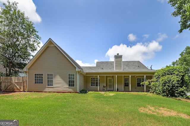 35 Deep Springs Way, Covington, GA 30016 - rear view of house featuring a chimney