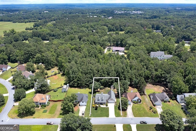 35 Deep Springs Way, Covington, GA 30016 - aerial view of residential area featuring a forest and property parcel outlined