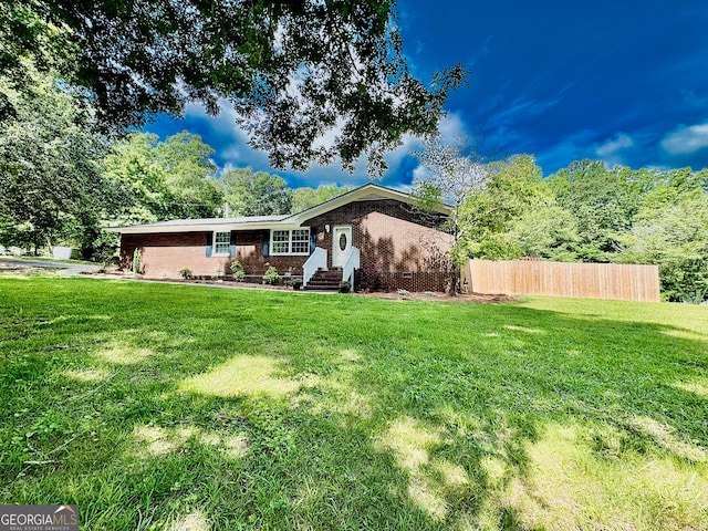 225 Second St, Bowdon, GA 30108 - view of front of home with brick siding and entry steps