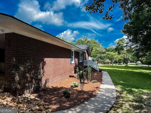 225 Second St, Bowdon, GA 30108 - view of side of property with crawl space, a lawn, and brick siding