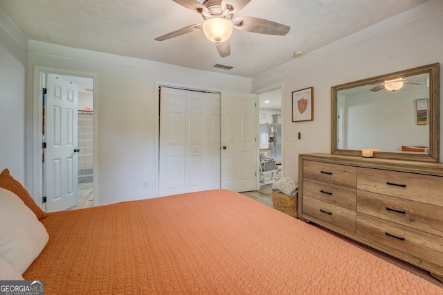 527 Malcom Rd, Covington, GA 30014 - bedroom featuring a closet, a ceiling fan, and ensuite bathroom