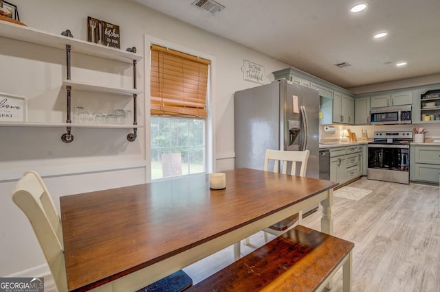 527 Malcom Rd, Covington, GA 30014 - dining area with recessed lighting and light wood-style floors