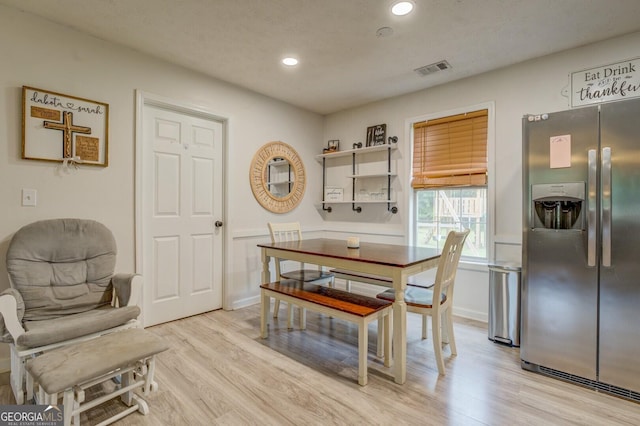 527 Malcom Rd, Covington, GA 30014 - dining space featuring light wood-style floors, recessed lighting, and wainscoting
