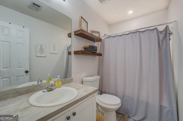 527 Malcom Rd, Covington, GA 30014 - bathroom featuring vanity, toilet, and a shower with shower curtain