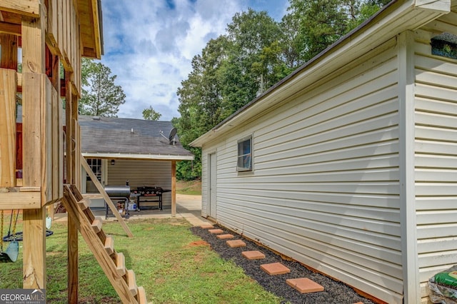 527 Malcom Rd, Covington, GA 30014 - view of green lawn featuring a patio