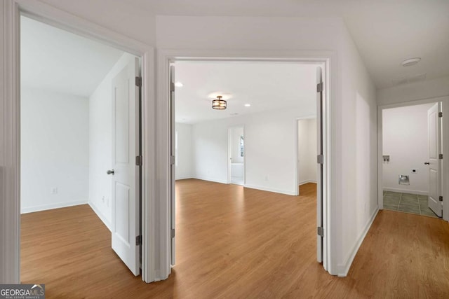 4095 Oriole Ln, Fairburn, GA 30213 - hall featuring light wood-style floors