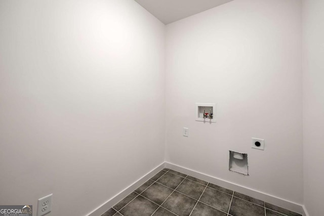 4095 Oriole Ln, Fairburn, GA 30213 - laundry room featuring electric dryer hookup, hookup for a washing machine, and dark tile patterned flooring