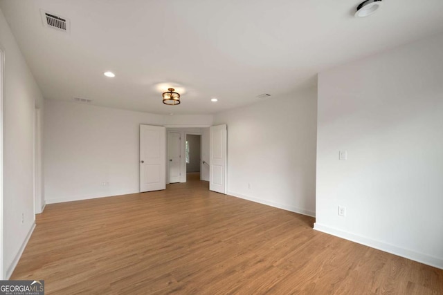 4095 Oriole Ln, Fairburn, GA 30213 - empty room with light wood-style floors and recessed lighting