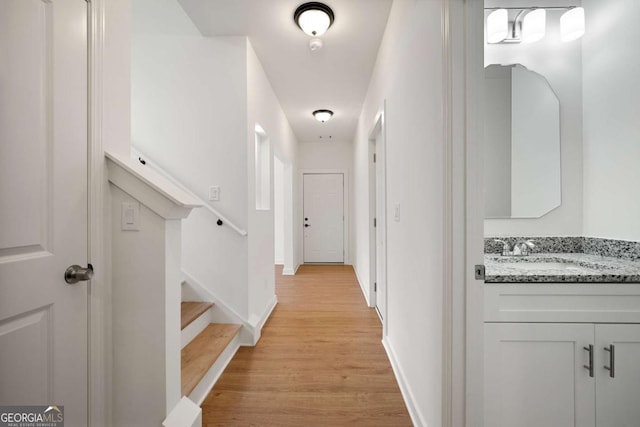 4095 Oriole Ln, Fairburn, GA 30213 - hall featuring light wood-style flooring and stairway