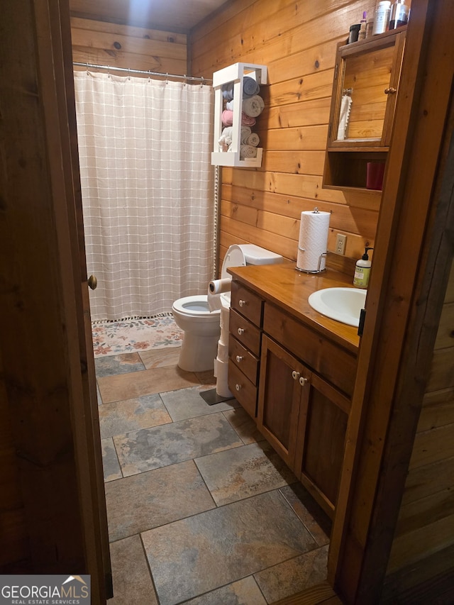 1151 Twin Mountain Lakes Cir, Talking Rock, GA 30175 - full bath with stone finish flooring, vanity, a shower with shower curtain, and wooden walls