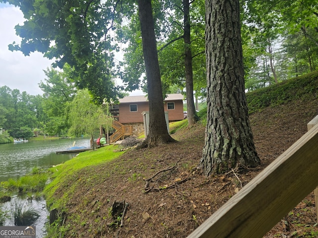 1151 Twin Mountain Lakes Cir, Talking Rock, GA 30175 - view of yard featuring a water view, stairway, and a dock