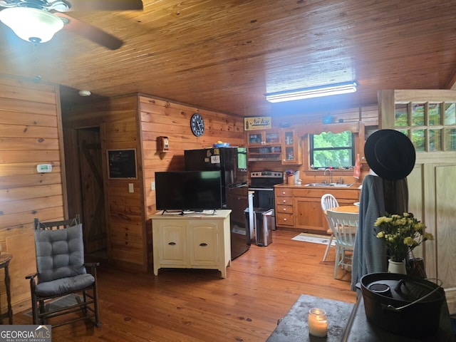 1151 Twin Mountain Lakes Cir, Talking Rock, GA 30175 - living room featuring light wood-style flooring, ceiling fan, wooden walls, and wood ceiling