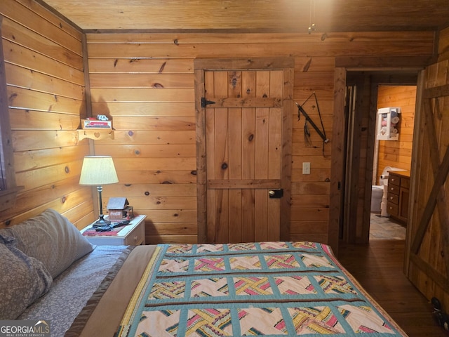 1151 Twin Mountain Lakes Cir, Talking Rock, GA 30175 - bedroom with wood walls, wood finished floors, wood ceiling, and ensuite bath
