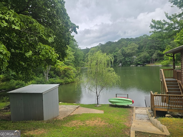 1151 Twin Mountain Lakes Cir, Talking Rock, GA 30175 - dock area featuring a water view, stairs, and a wooded view