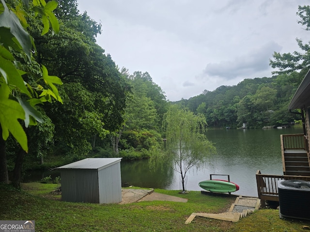 1151 Twin Mountain Lakes Cir, Talking Rock, GA 30175 - view of yard with a water view and a forest view